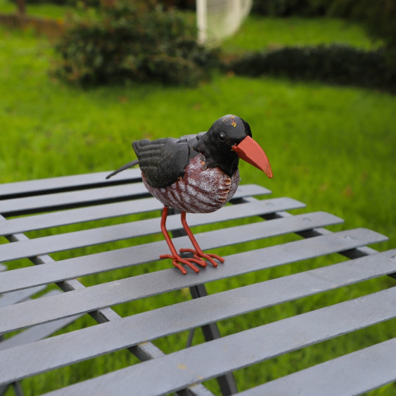 Oiseau en métal noir et marron