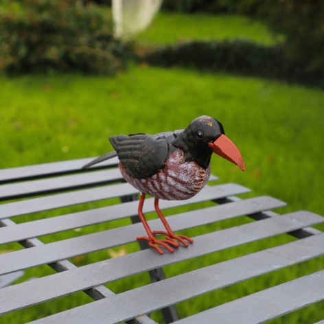 Oiseau en métal noir et marron