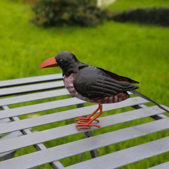 Oiseau en métal noir et marron