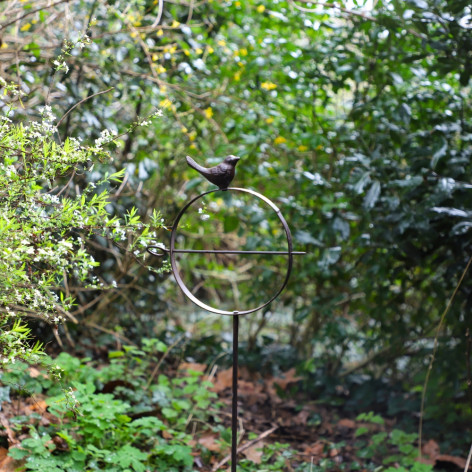 Suspension en fonte avec oiseau