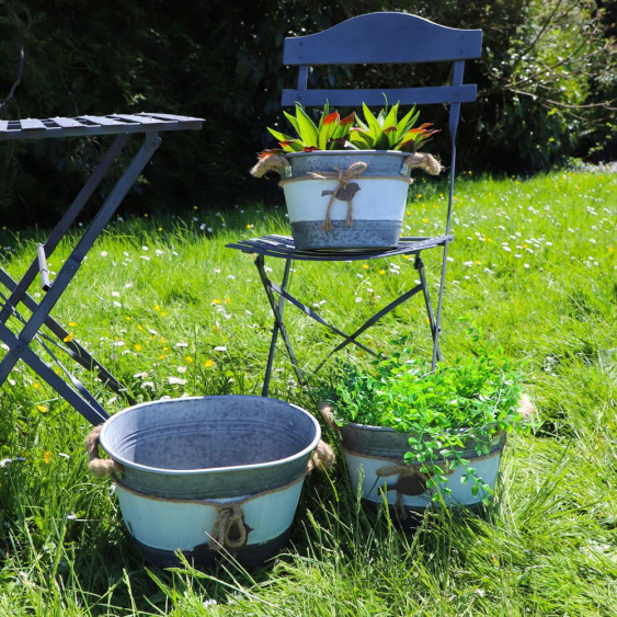 Set de 3 jardinières ovales en zinc avec poignées en cordelette et oiseau suspendu